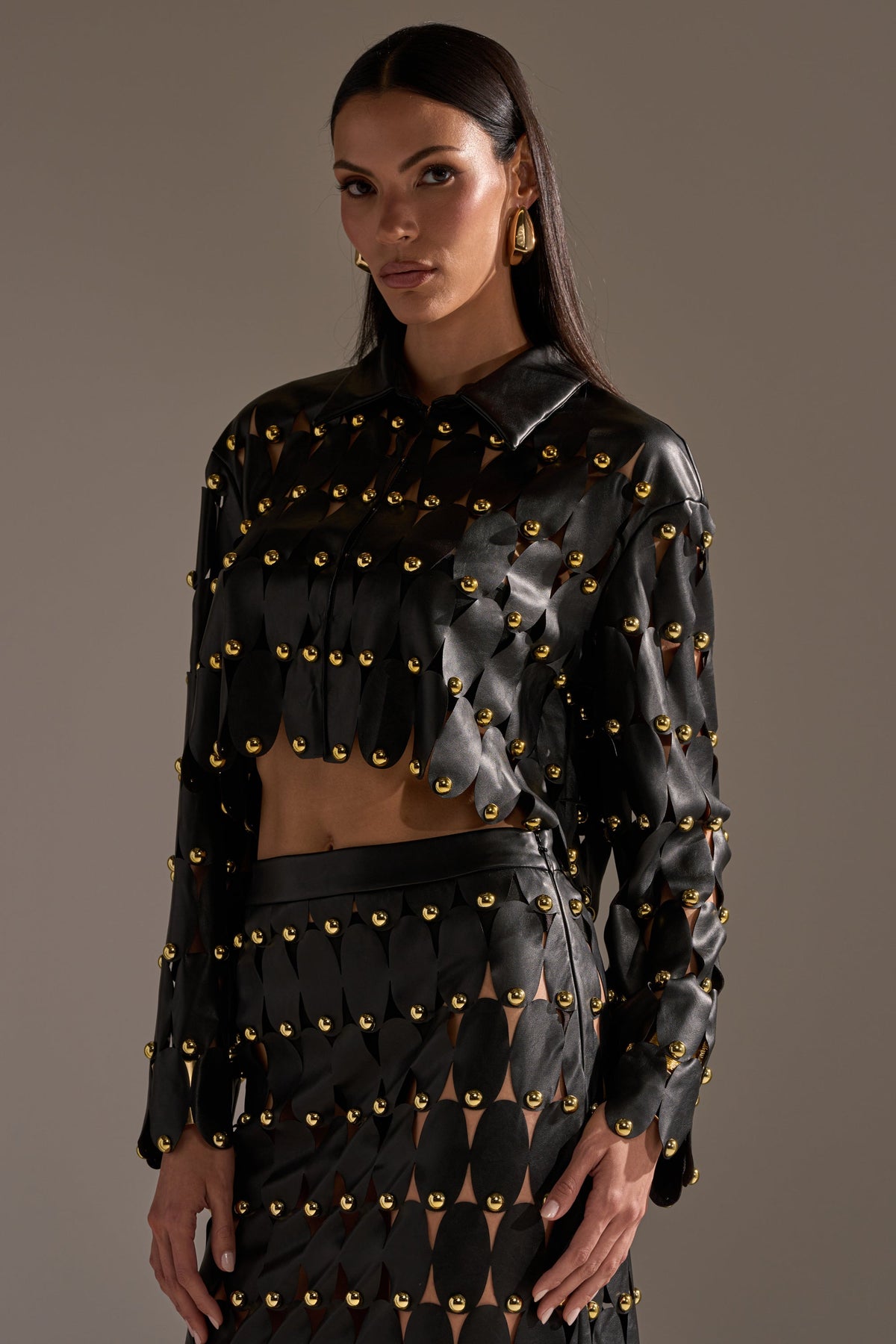 THE SNEAK PEEK STUDDED PU BLOUSE IN BLACK