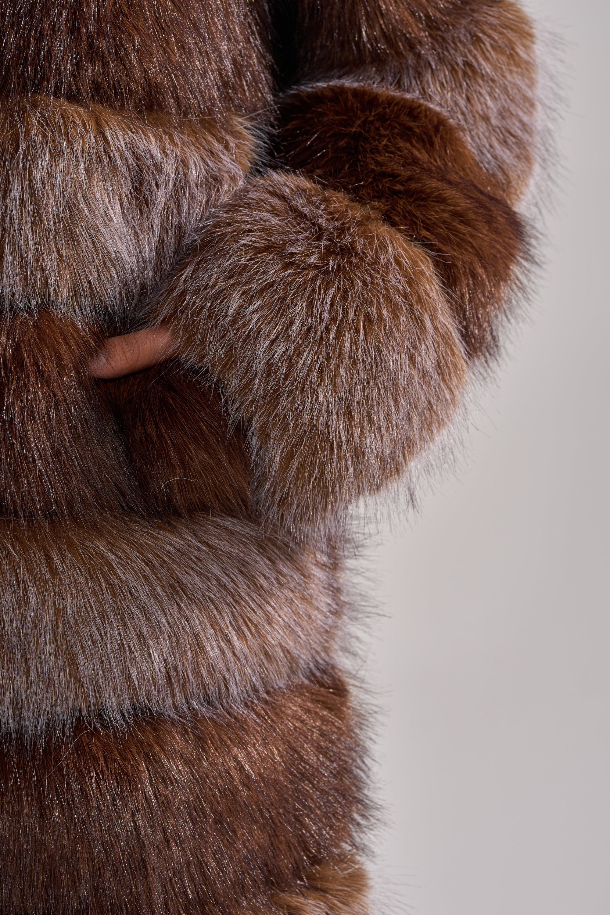 LITTLE BIT OF SPICE PANELED FAUX FUR COAT